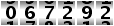 067292