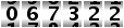 067322