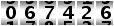 067426