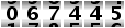 067445