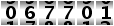 067701