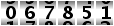 067851