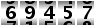 69457