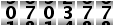 070377